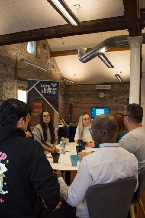 Adult learners having a group discussion at ISI Dublin Meetinghouse Lane